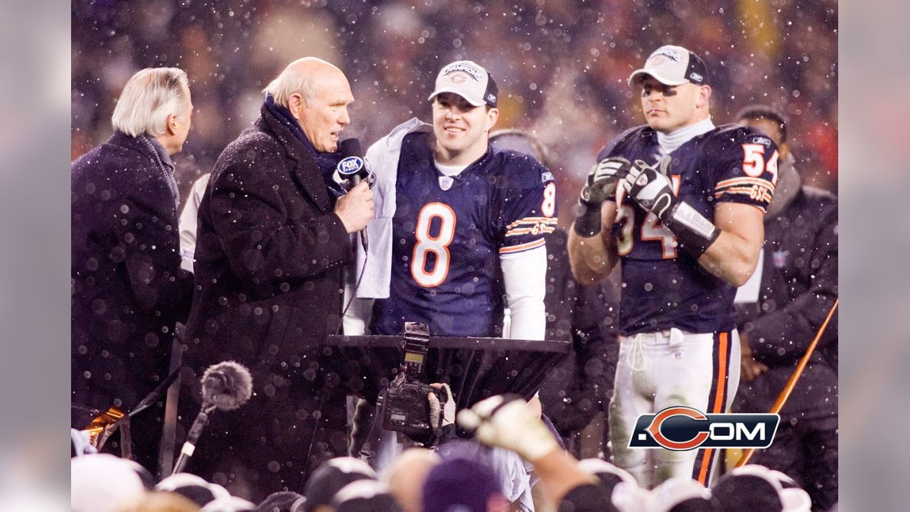 Chicago Bears chairman Michael McCaskey, left, and owner Virginia McCaskey  , center, react as they are presented with the George Halas Trophy after  the Bears beat the New Orleans Saints, 39-14, to