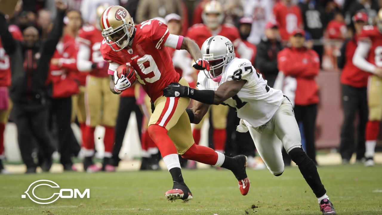 Ted Ginn Jr. #19 of the San Francisco 49ers standing on the field