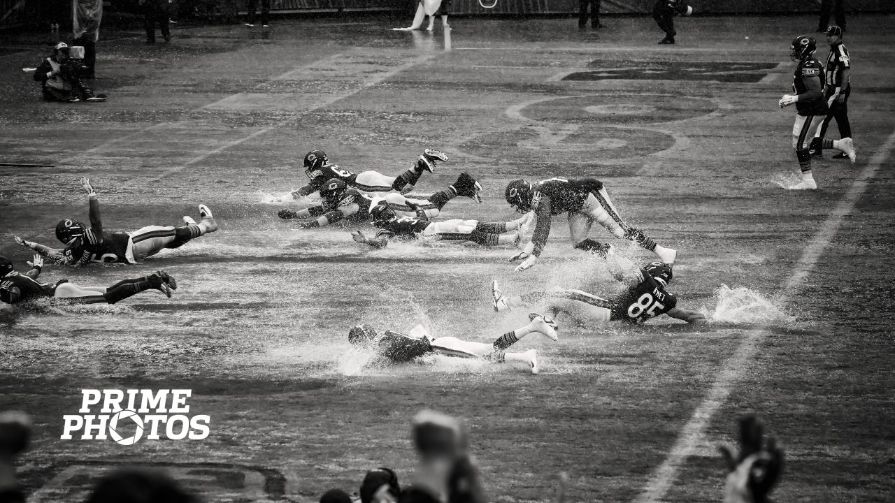 Time to make a splash! Chicago's Soldier Field left SATURATED by torrential  rain before NFL opener