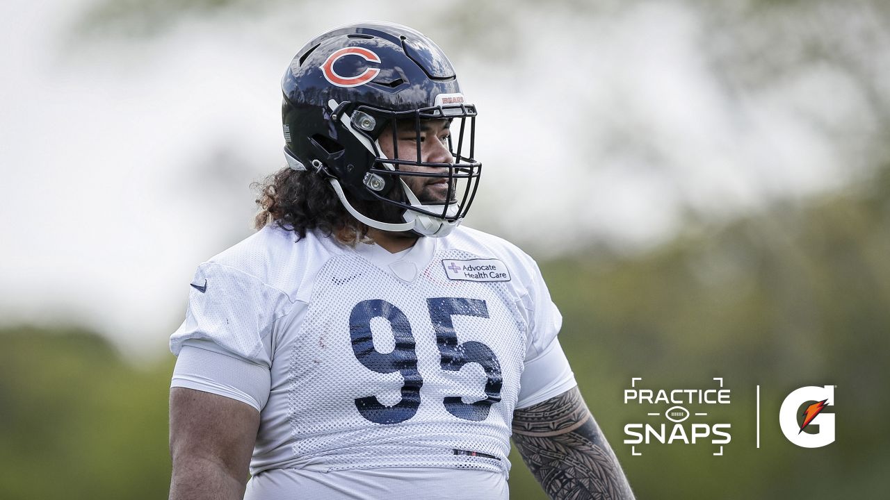 LAKE FOREST, IL - JUNE 15: Chicago Bears quarterback Justin Fields (1)  adjusts his helmet during the the Chicago Bears Minicamp on June 15, 2022  at Halas Hall in Lake Forest, IL. (