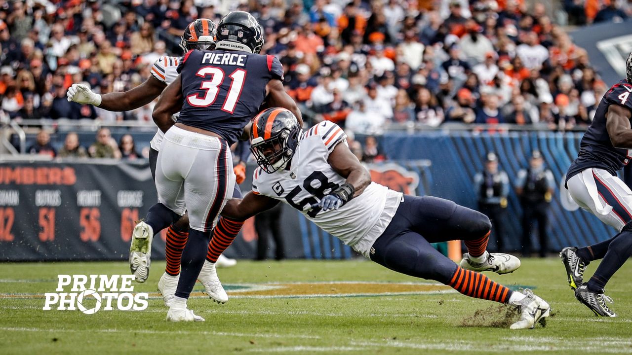 Chicago Bears' Cody Whitehair (65) leaps to congratulate teammate Khalil  Herbert on Herbert's touchdown against the Seattle Seahawks during the  second half of an NFL football game, Sunday, Dec. 26, 2021, in