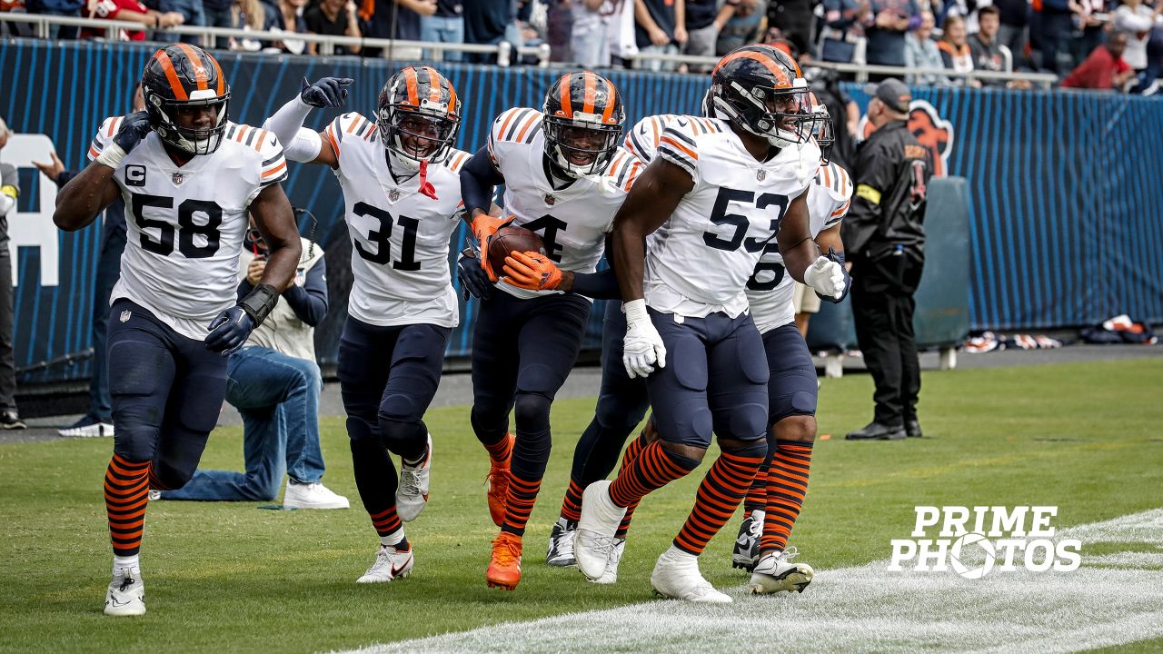 Chicago Bears' Cody Whitehair (65) leaps to congratulate teammate Khalil  Herbert on Herbert's touchdown against the Seattle Seahawks during the  second half of an NFL football game, Sunday, Dec. 26, 2021, in