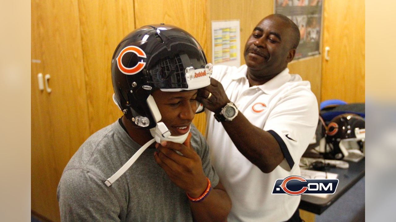 Chicago Bears - Bears equipment manager Tony Medlin fits rookie WR