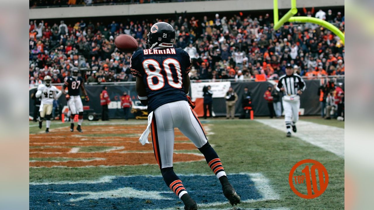 Chicago Bears wide receiver Bernard Berrian is hit by Dallas