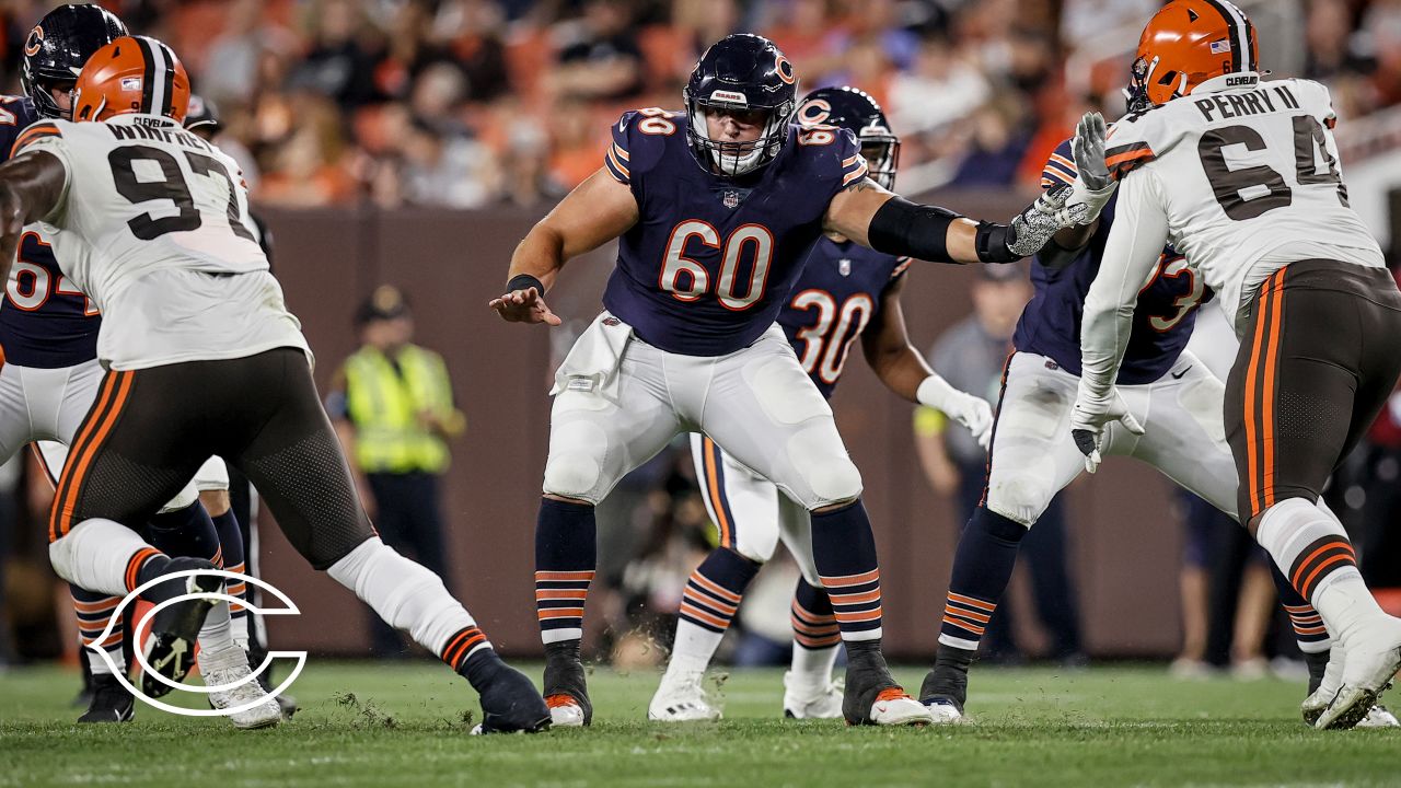 Chicago Bears guard Dieter Eiselen (60) and safety DeAndre Houston-Carson  (36) celebrate the Bears win against the San Francisco 49ers in an NFL  football game, Sunday, Sept. 11, 2022, in Chicago. (AP