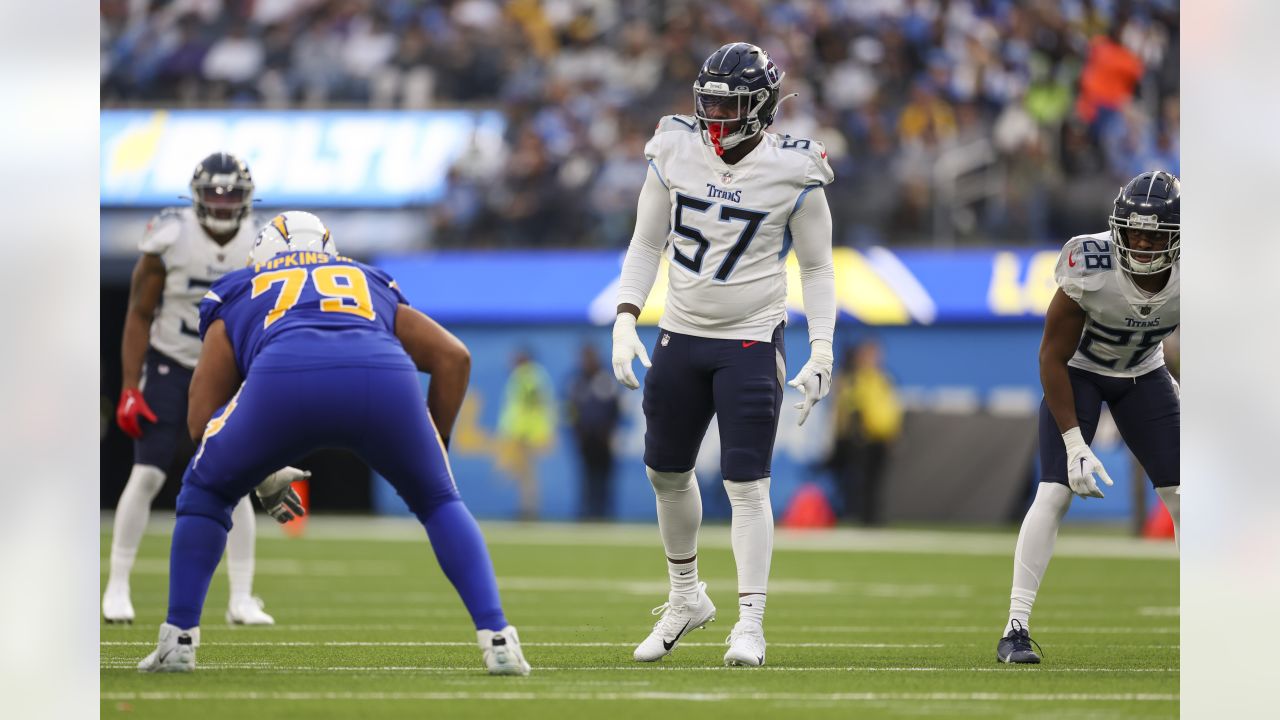 Tarell Basham of the Tennessee Titans defends against the Dallas