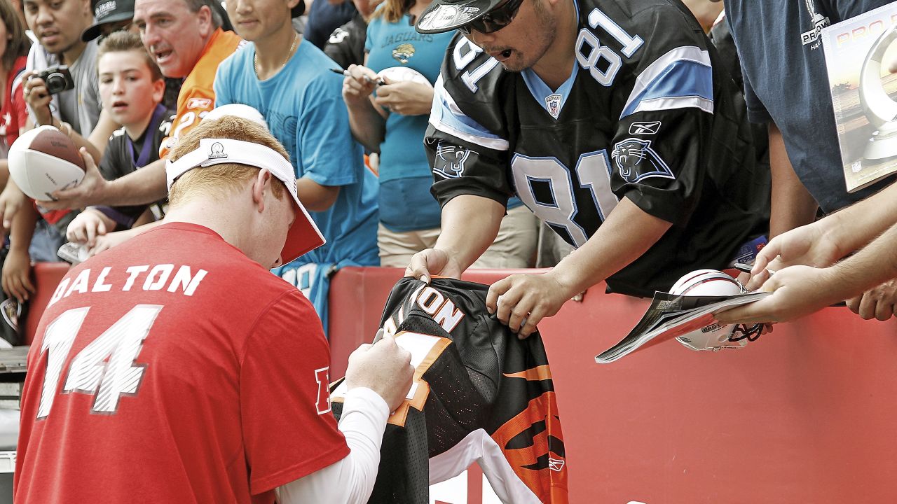 Cincinnati Bengals - Cincinnati Bengals second round draft pick Andy Dalton  poses with his jersey during an NFL football news conference, Saturday,  April 30, 2011, in Cincinnati. (AP Photo/David Kohl) AP2011