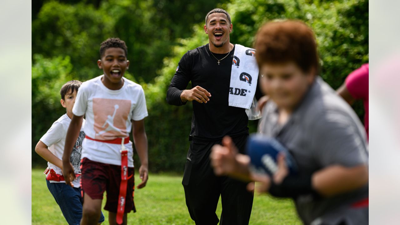 Bengals Rookies play flag football with schoolkids