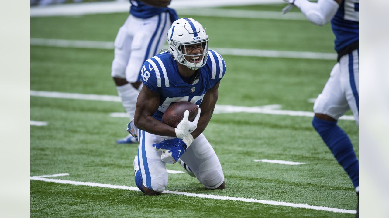 Cincinnati Bengals' A.J. Green, top, is tackled by Indianapolis Colts' Khari  Willis (37) during the second half of an NFL football game, Sunday, Oct.  18, 2020, in Indianapolis. (AP Photo/Michael Conroy Stock