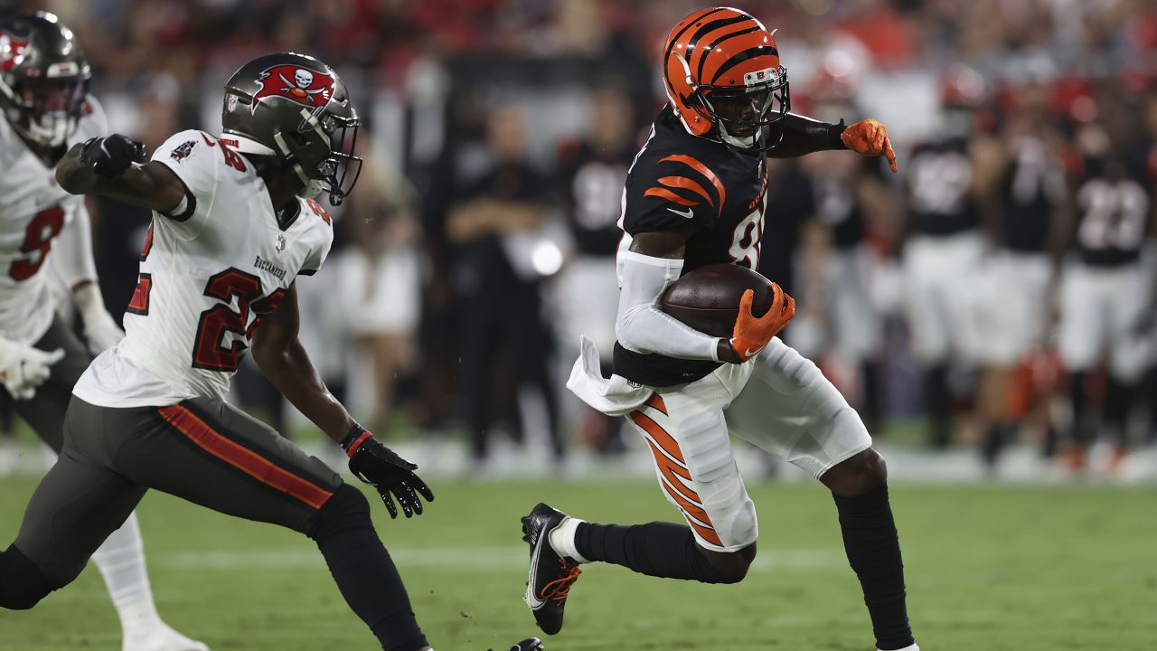 Cincinnati Bengals quarterback Brandon Allen (8) hands the ball off against  the Tampa Bay Buccaneers in a pre-season NFL football game, Saturday, Aug.  14, 2021 in Tampa, Fla. (AP Photo/Alex Menendez Stock