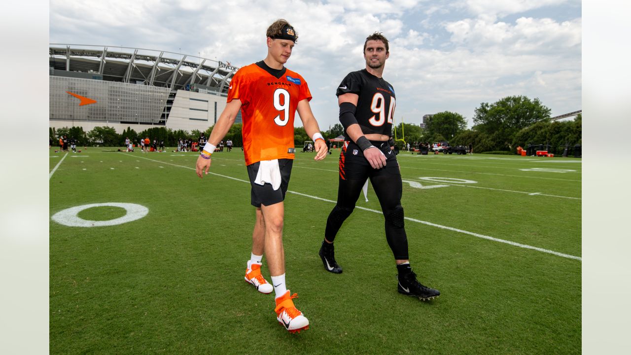 FILE - Cincinnati Bengals' Joe Mixon (28) and Orlando Brown Jr. (75) walk  onto the field during practice at the team's NFL football training  facility, Tuesday, June 6, 2023, in Cincinnati. The