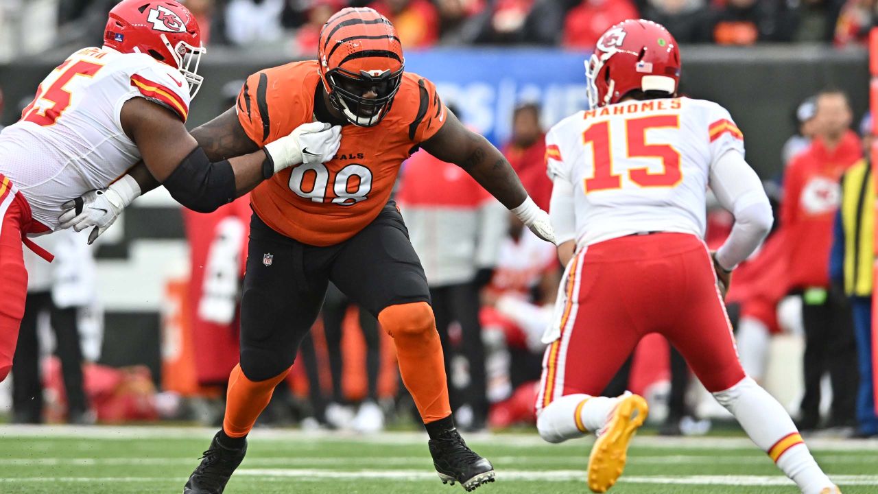 Cincinnati Bengals long snapper Clark Harris tosses a football to a fan  before the AFC championship NFL football game against the Kansas City Chiefs,  Sunday, Jan. 30, 2022, in Kansas City, Mo. (