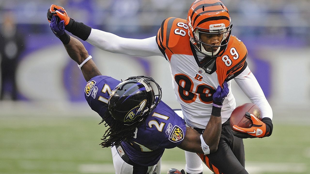 BALTIMORE, MD - OCTOBER 09: Baltimore Ravens cornerback Marcus Peters (24)  defends a pass intended for Bengals wide receiver Ja'Marr Chase (1) during  the Cincinnati Bengals versus Baltimore Ravens NFL game at