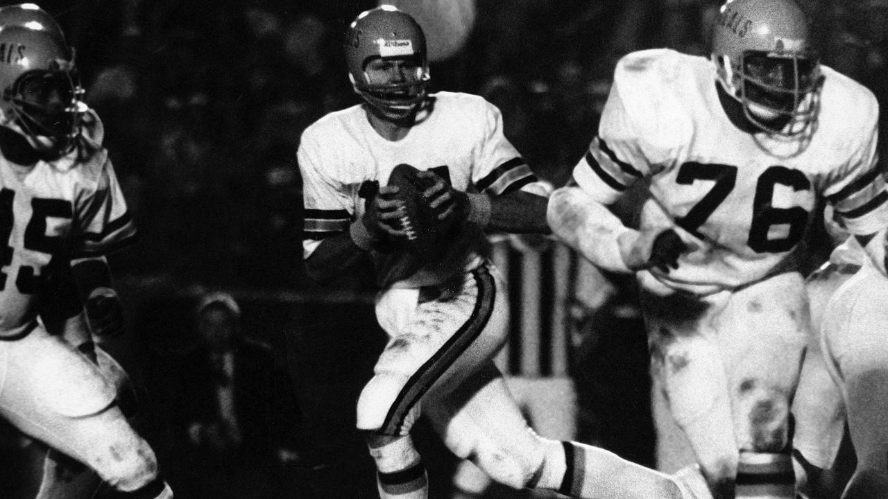 Houston Oilers' Charley Johnson (12) was crunched by Cincinnati Bengals  Royce Berry while trying to get away a short pass from his own  six-yard-line in second quarter of a NFL game on