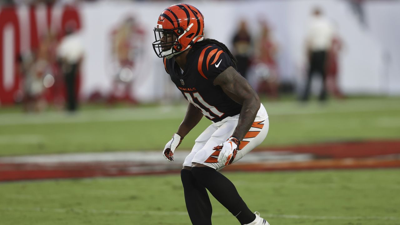 Cincinnati Bengals quarterback Brandon Allen (8) hands the ball off against  the Tampa Bay Buccaneers in a pre-season NFL football game, Saturday, Aug.  14, 2021 in Tampa, Fla. (AP Photo/Alex Menendez Stock