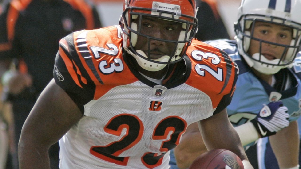 Cincinnati Bengals running back Corey Dillon (28) runs downfield with  linebacker Takeo Spikes, left, in pursuit, Wednesday, Aug. 1, 2001, at  training camp in Georgetown, Ky. Dillon is only expected to play