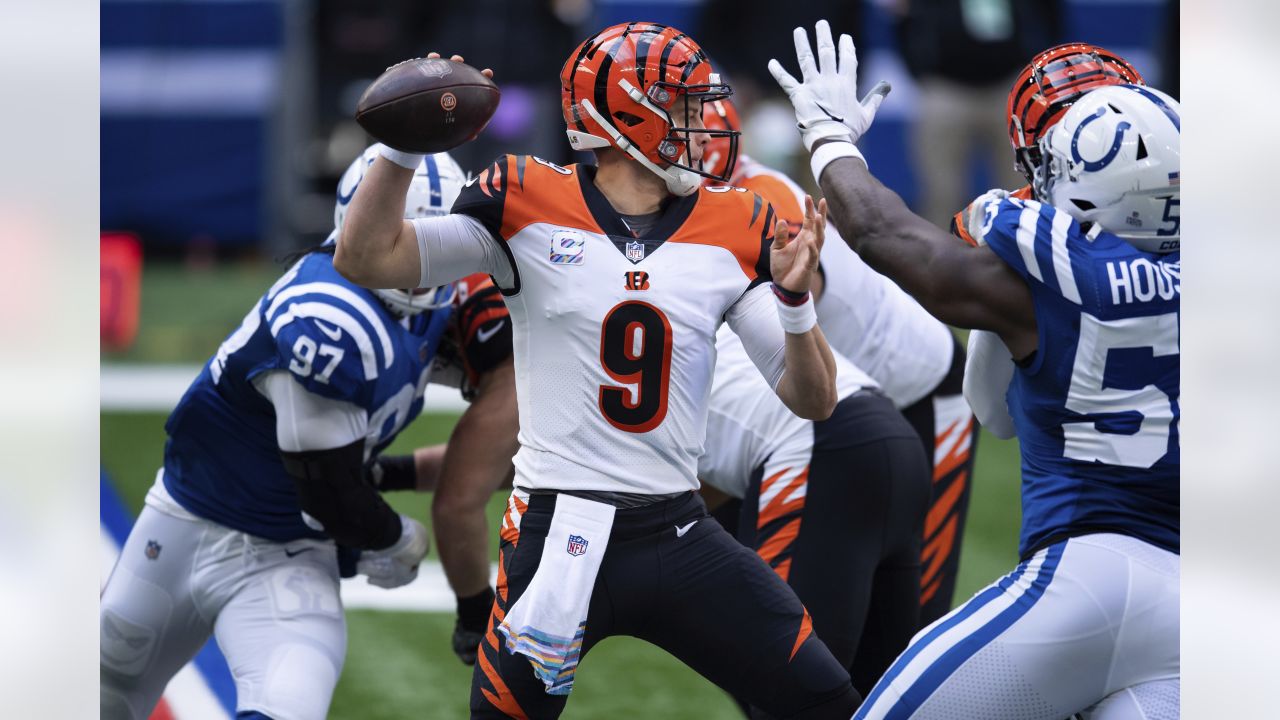 Cincinnati Bengals quarterback Joe Burrow (9) runs off the field after a 34-31  win over the Kan …