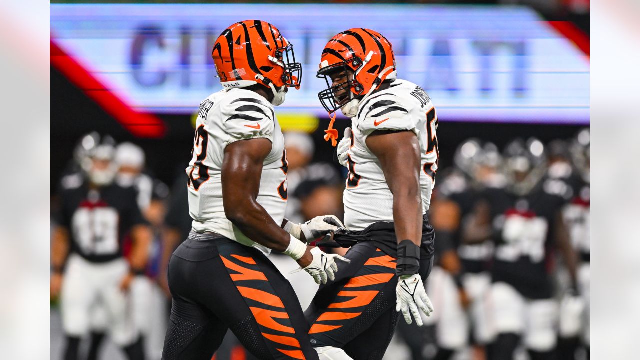 Cincinnati Bengals defensive end Raymond Johnson III drops back to defend  during the second half of an NFL preseason football game between the Cincinnati  Bengals and the Washington Commanders, Saturday, Aug. 26