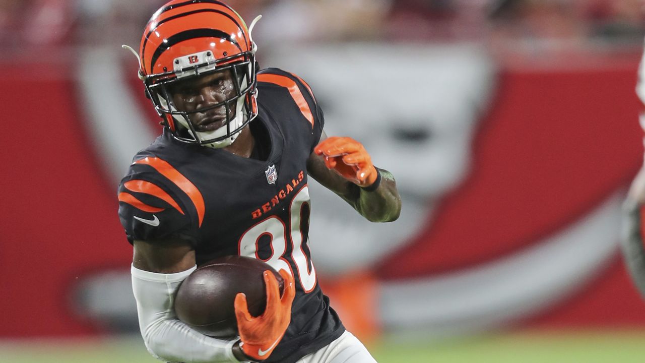 Cincinnati Bengals running back Chris Evans (25) and offensive tackle D'Ante  Smith (70) celebrate after Evans scored a touchdown during the second half  of an NFL football game, Sunday, Jan. 9, 2022