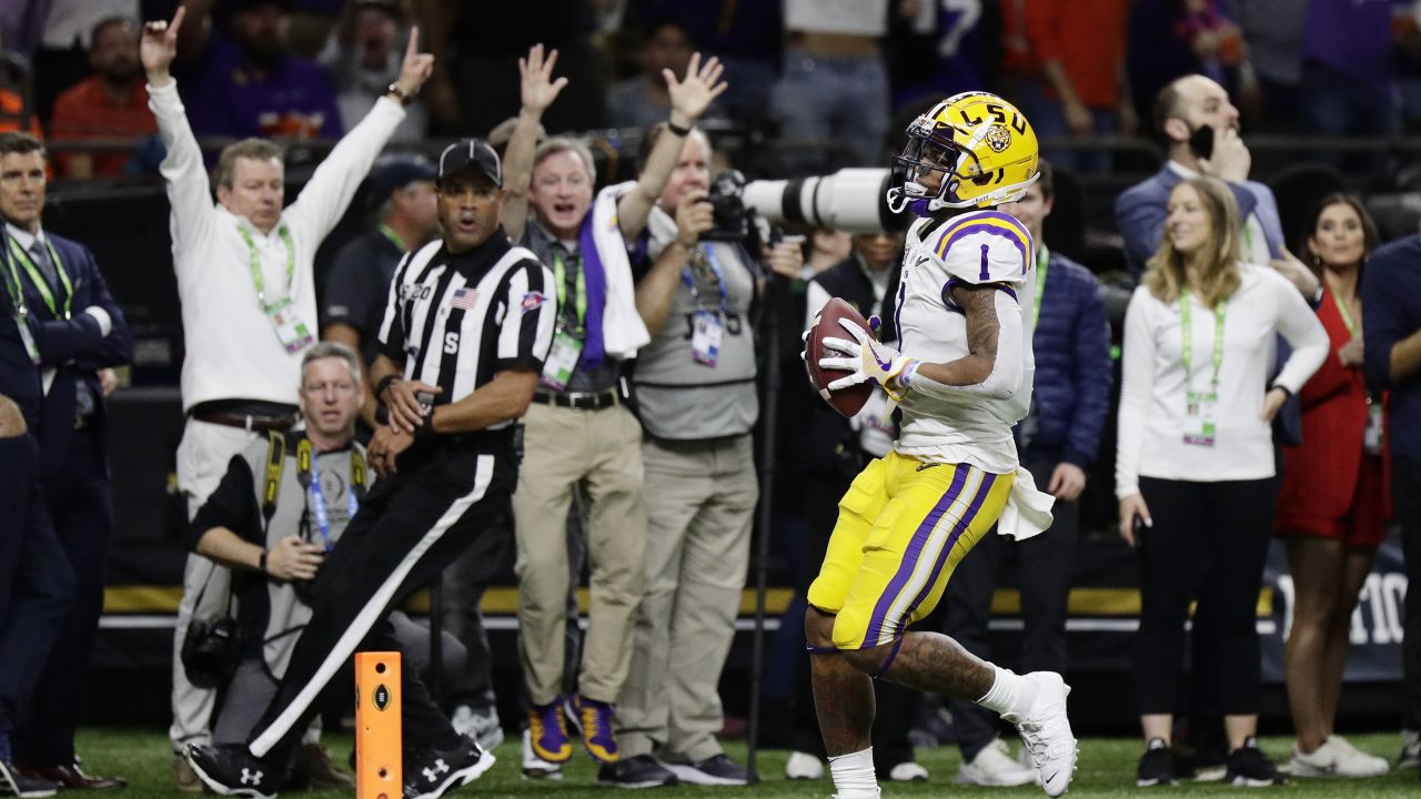 Watch: Former LSU WR Ja'Marr Chase hauls in first NFL reception, makes  Bengals history