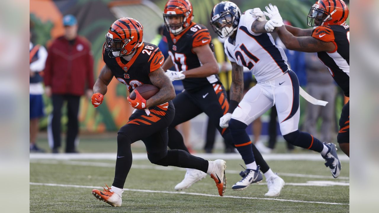 of the Denver Broncos runs the ball against the Cincinnati Bengals