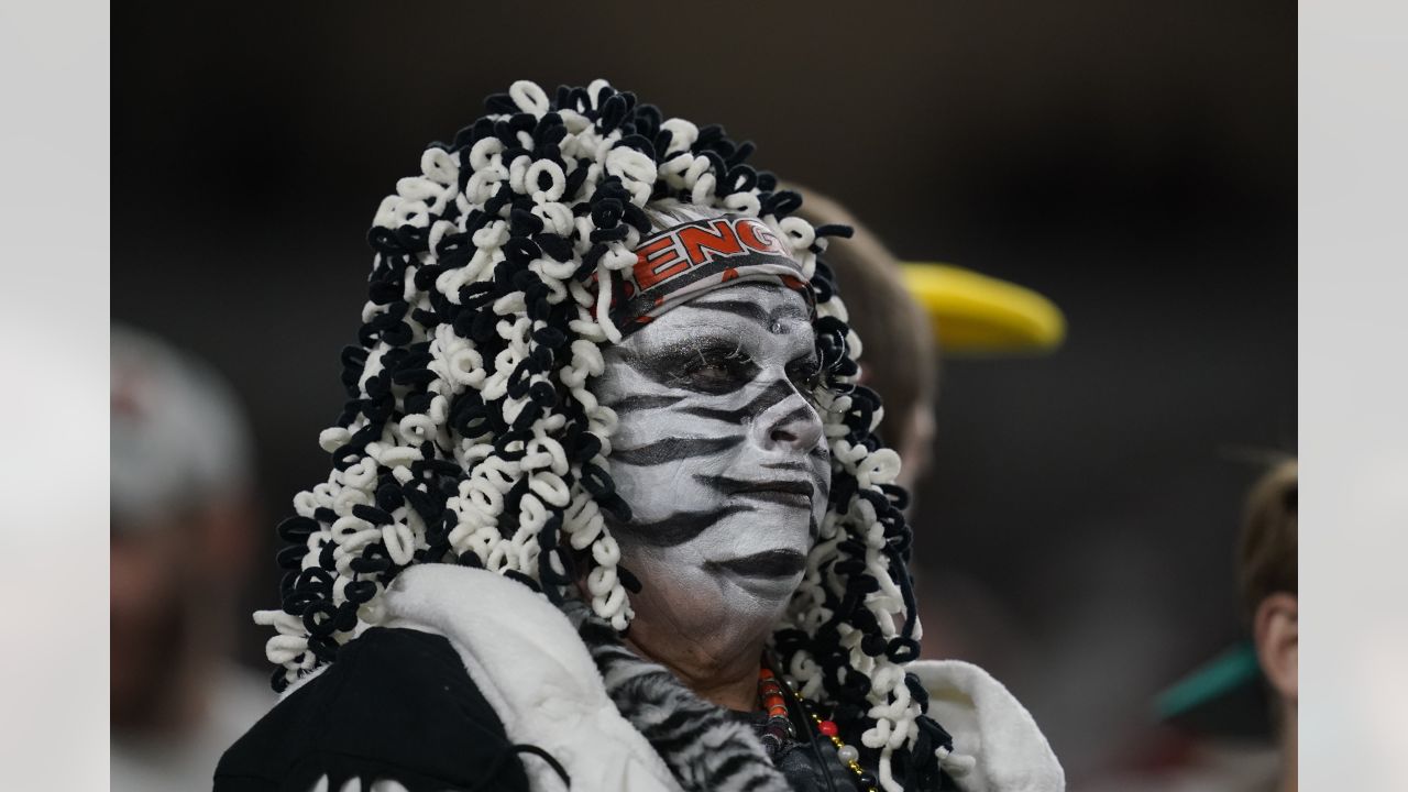 Miami Dolphins vs. Cincinnati Bengals. NFL Game. American Football League  match. Silhouette of professional player celebrate touch down. Screen in  bac Stock Photo - Alamy