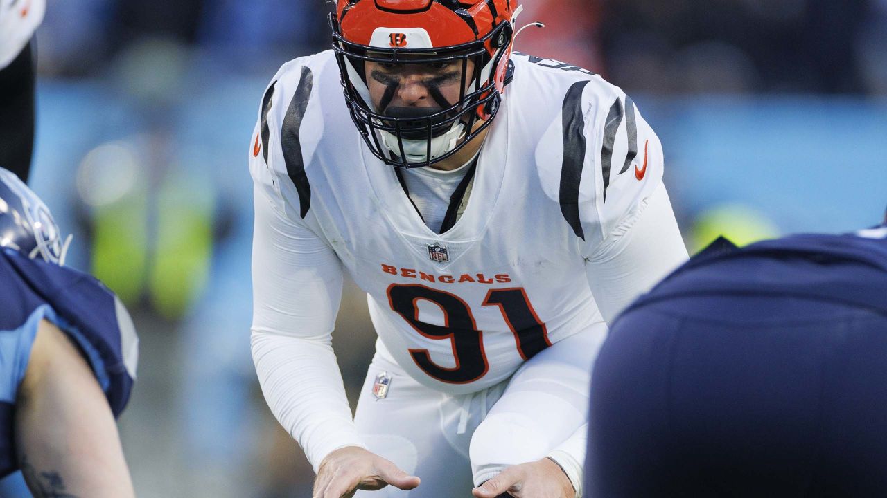 Cincinnati Bengals defensive end Trey Hendrickson (91) pauses on the field  against the Tennessee Titans during the second quarter of an NFL divisional  playoff football game, Saturday, Jan. 22, 2022, in Nashville