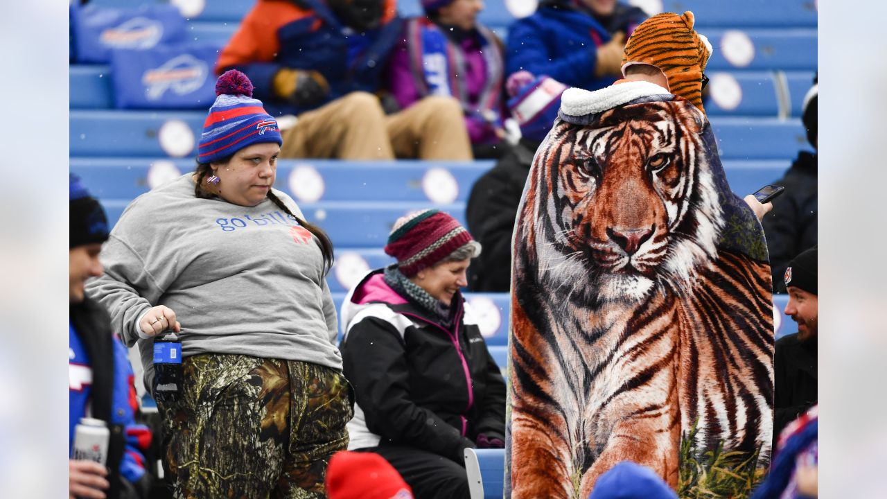 Buffalo Bills fans watch players warm up before an NFL division round  football game between the Buffalo Bills and the Cincinnati Bengals, Sunday,  Jan. 22, 2023, in Orchard Park, N.Y. (AP Photo/Seth