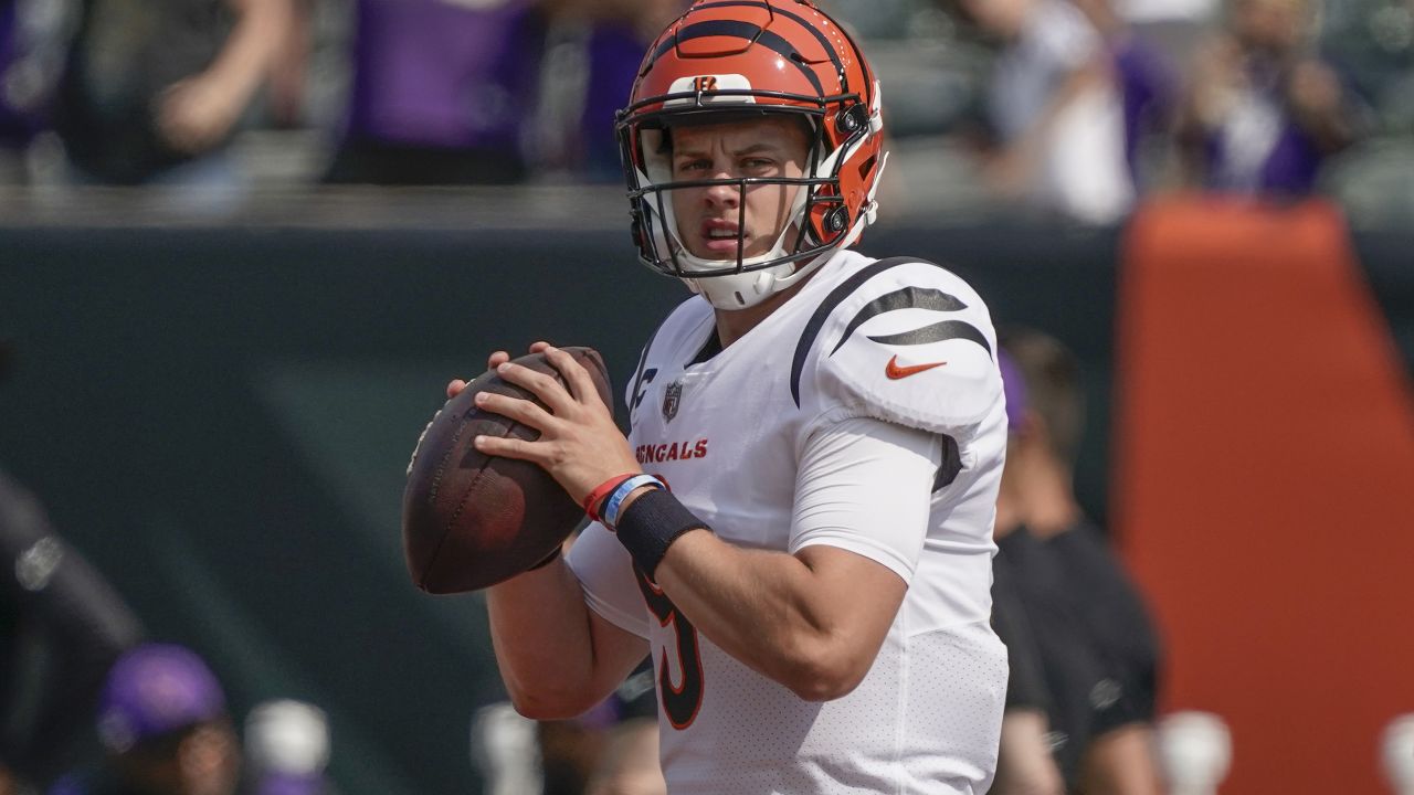 Team captains gather at center field for the coin flip before an NFL  football game between the Cincinnati Bengals and the Minnesota Vikings,  Sunday, Sept. 12, 2021, in Cincinnati. (AP Photo/Keith Srakocic