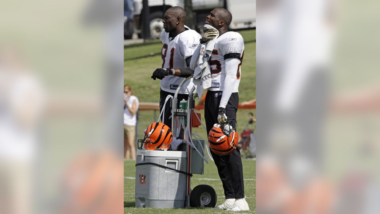 Cincinnati Bengals wide receiver Chad Ochocinco (85) puts his phone number  in a young fans phone during a time out at Bengals training camp at  Georgetown College in Georgetown Ky. (Credit Image: ©