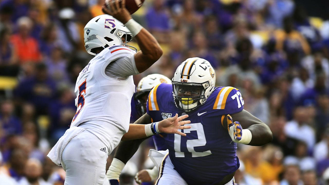 Cincinnati Bengals defensive tackle Tyler Shelvin (99) runs for the play  during a preseason NFL football game against the Los Angeles Rams,  Saturday, Aug. 27, 2022, in Cincinnati. (AP Photo/Emilee Chinn Stock