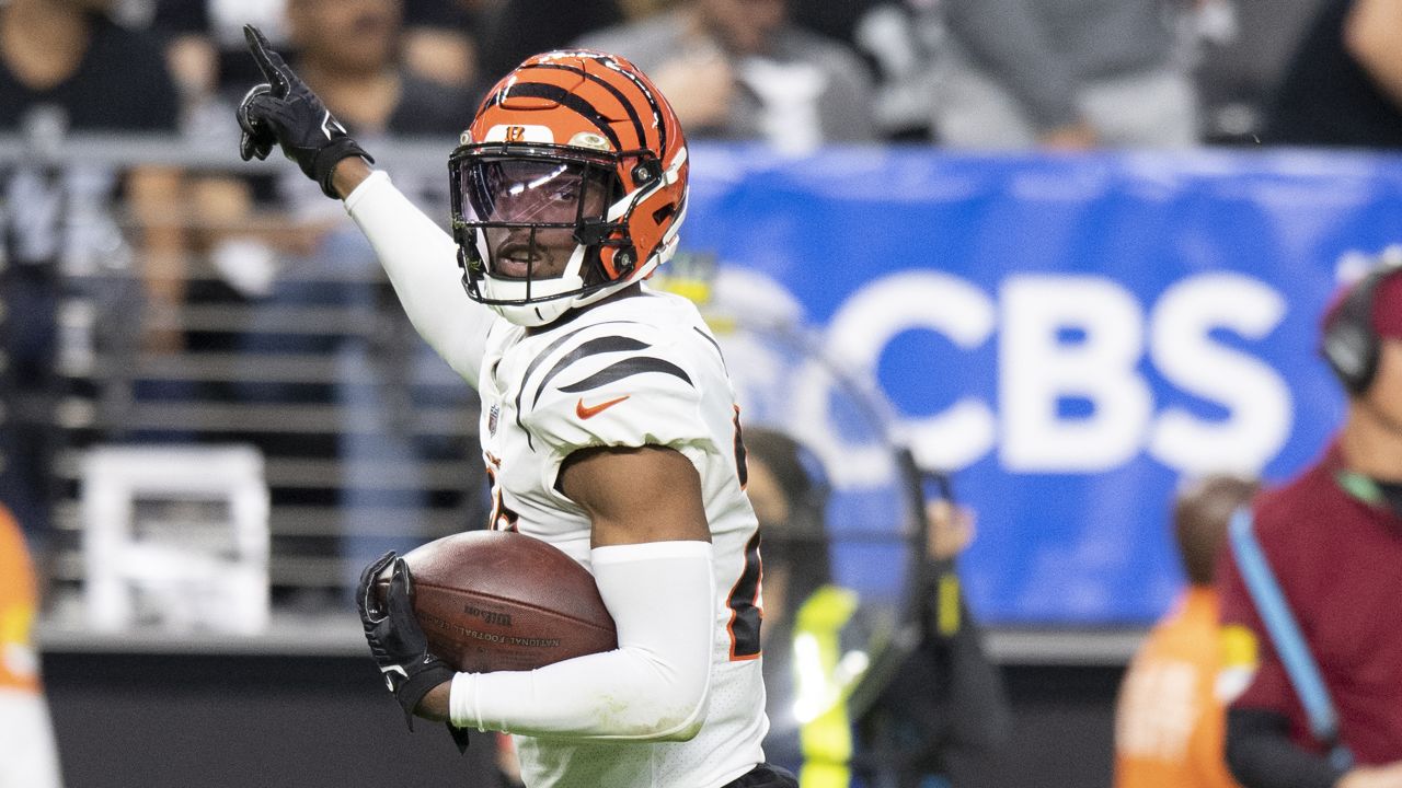 Las Vegas Raiders defensive back Dallin Leavitt (32) tackles Cincinnati  Bengals quarterback Joe …