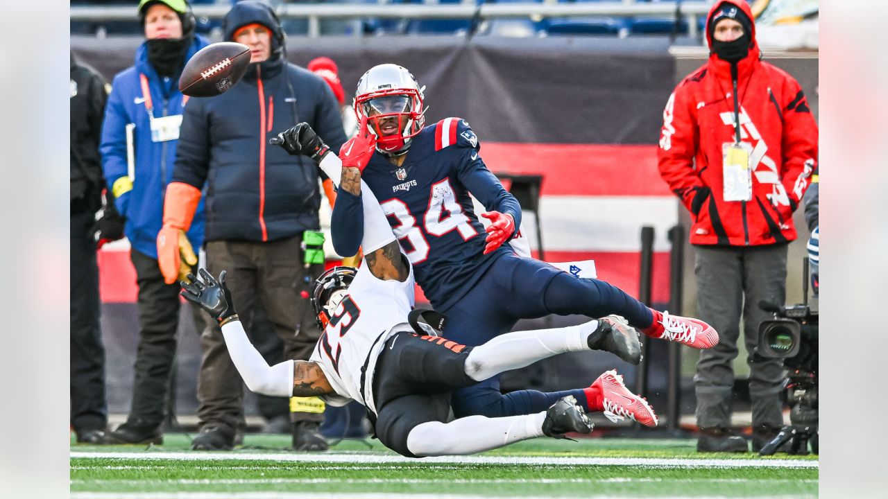 August 19, 2022; Foxborough, MA, USA; New England Patriots running back  J.J. Taylor (42) avoids a tackle during the NFL pre-season game between  Carolina Panthers and New England Patriots at Gillette Stadium.