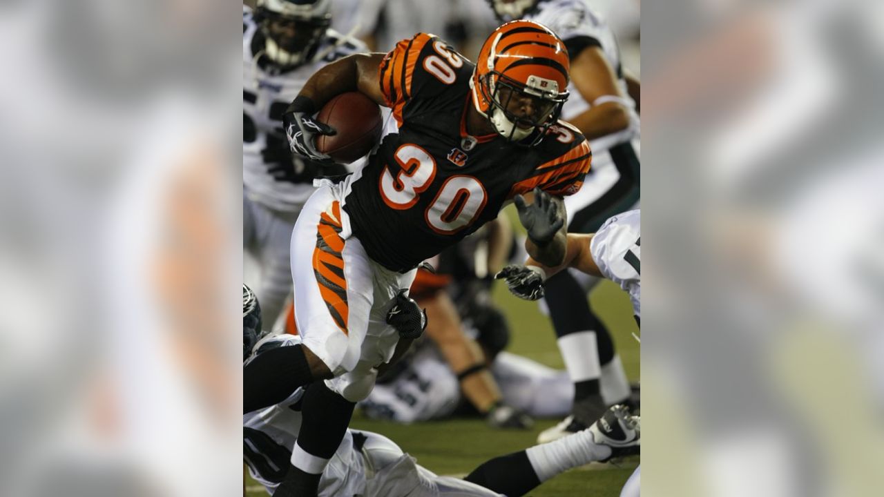 Cedric Peerman of the Cincinnati Bengals is brought down by Kenny News  Photo - Getty Images