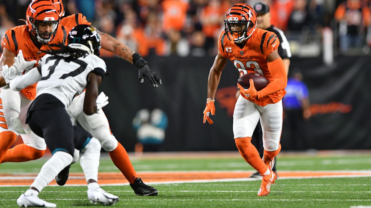 Jacksonville Jaguars' James Robinson (25) is tackled by Cincinnati Bengals'  Vonn Bell (24) during the first half of an NFL football game, Thursday,  Sept. 30, 2021, in Cincinnati. (AP Photo/Michael Conroy Stock Photo - Alamy