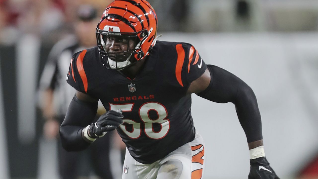 TAMPA, FL - DECEMBER 18: Cincinnati Bengals linebacker Logan Wilson (55)  brings down Tampa Bay Bucca