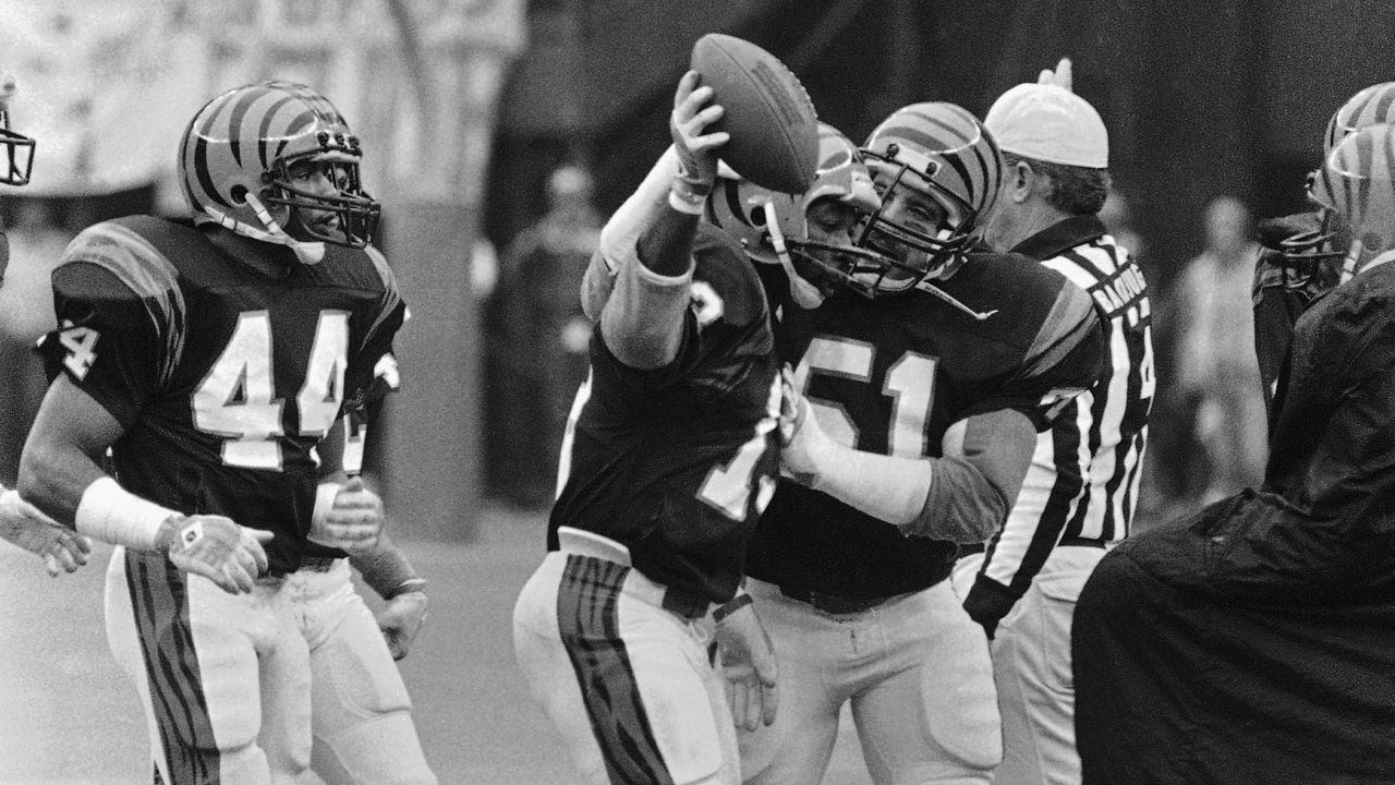 Cincinnati Bengals defensive back Ken Riley runs back an