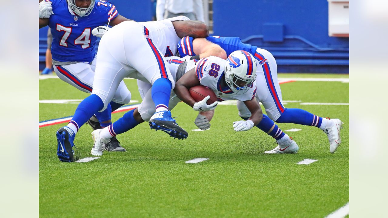 FOXBOROUGH, MA - DECEMBER 26: Buffalo Bills quarterback Josh Allen (17)  moves Buffalo Bills running back Devin Singletary (26) during a game  between the New England Patriots and the Buffalo Bills on