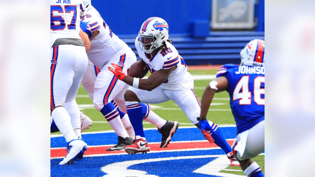 Buffalo Bills running back Zack Moss (20) celebrates with tackle