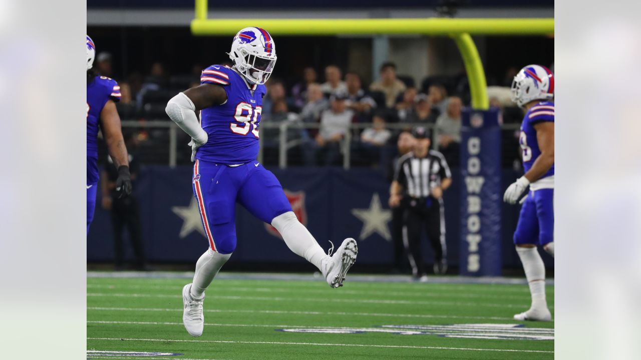 Buffalo Bills defensive tackle Jordan Phillips (97), left, lifts