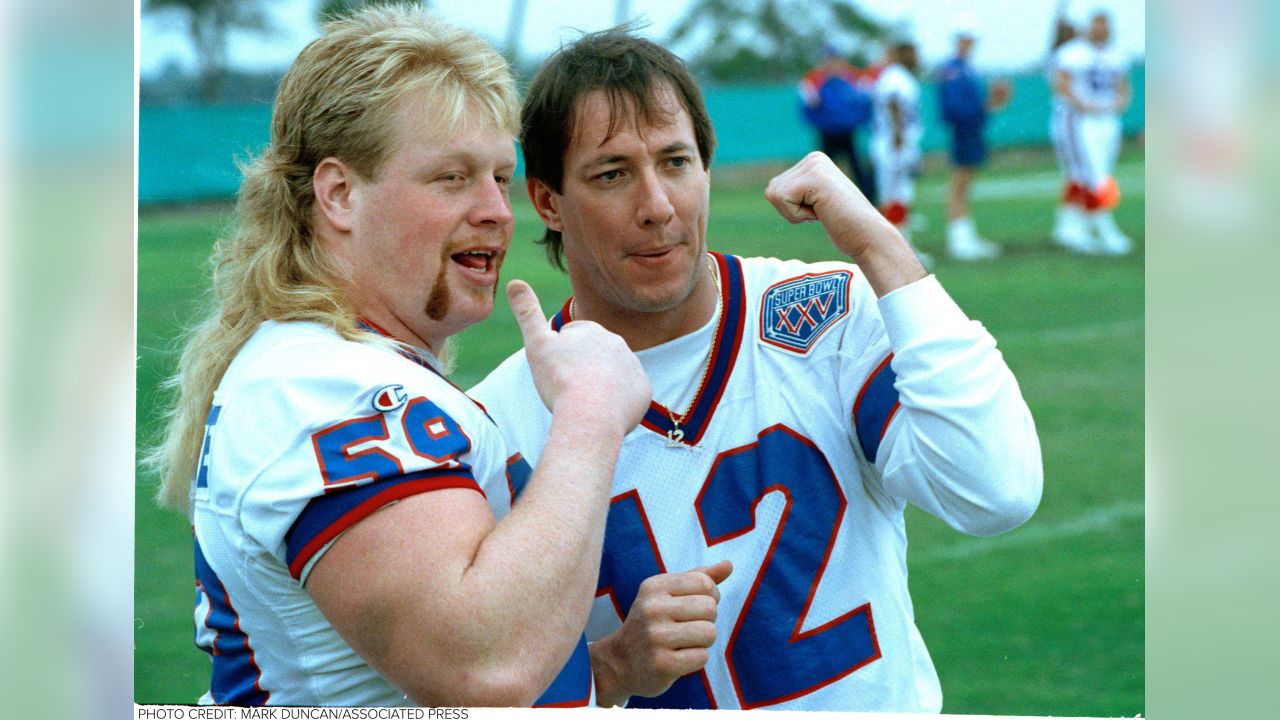 Buffalo Bills quarterback Jim Kelly celebrates the Bills first touchdown  against the New York Giants in Super Bowl XXV in Tampa on Jan. 27, 1991.  Kelly is expected to announce his retirement