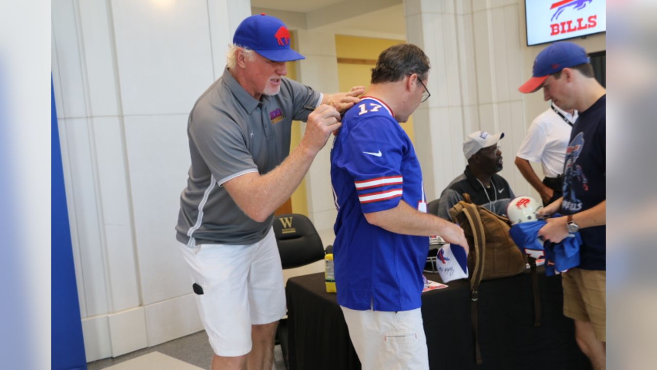 Former Carolina Panthers linebacker Luke Kuechly, left, greets Buffalo  Bills quarterback Josh Allen (17) during an NFL preseason football game on  Friday, Aug. 26, 2022, in Charlotte, N.C. (AP Photo/Rusty Jones Stock