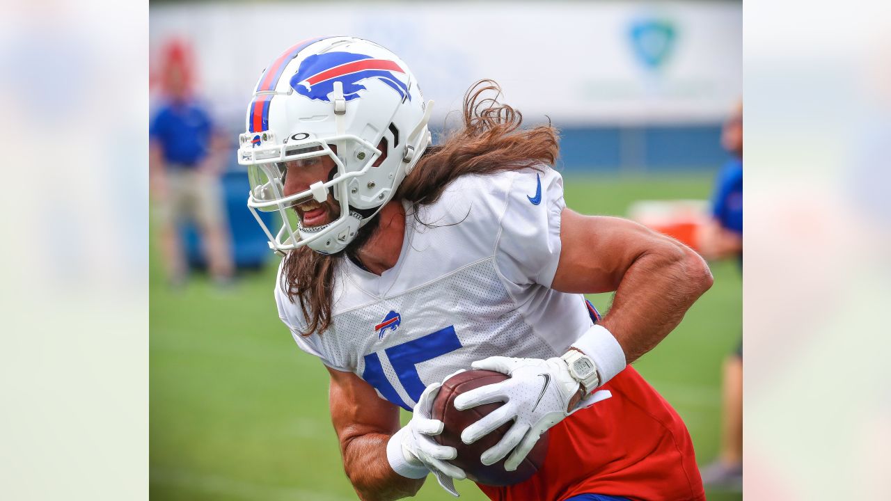 Buffalo Bills offensive lineman Dion Dawkins (73) sprays his face with  water during practice at the NFL football team's training camp in  Pittsford, N.Y., Monday July 25, 2022. (AP Photo/Joshua Bessex Stock