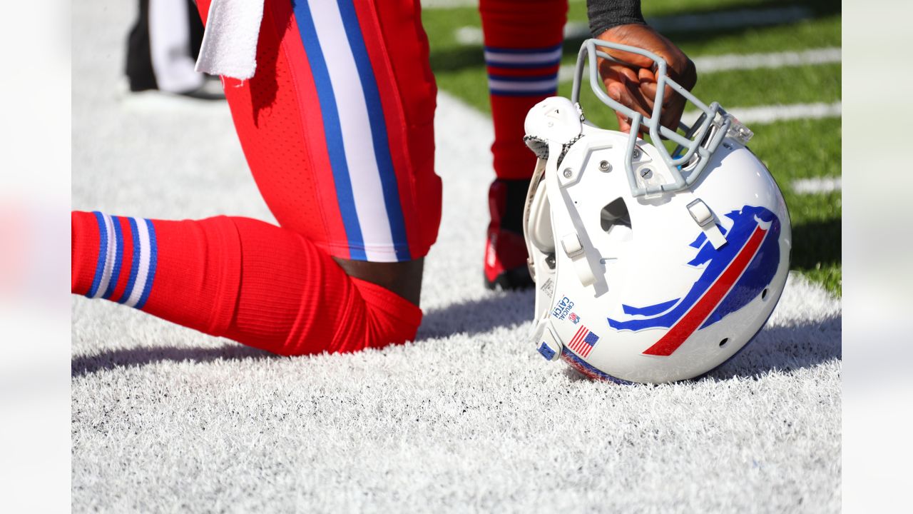 Buffalo Bills Helmet Logo (1965) - White helmet, red standing buffalo logo  with red and blue stripes, grey facemask