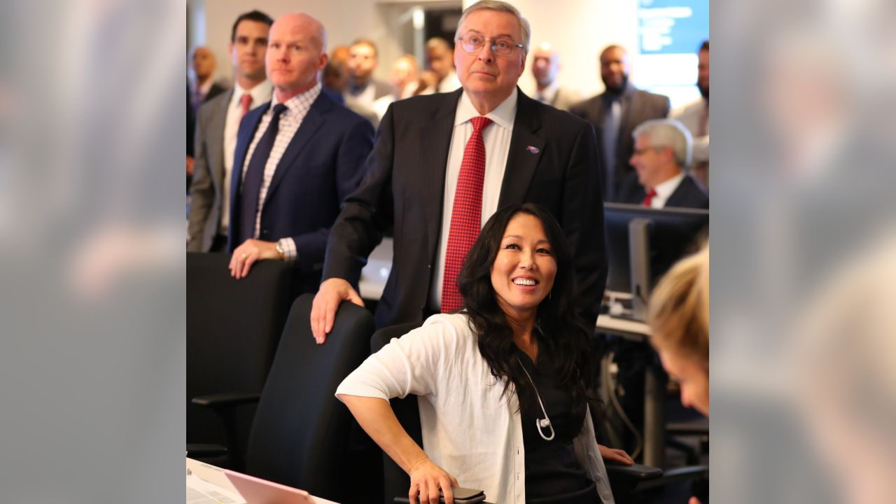 Buffalo Bills co-owner Kim Pegula, right, watches practice from the stands  with a friend during an NFL football training camp in Orchard Park, N.Y.,  Thursday, Aug. 20, 2020. (James P. McCoy/Pool Photo