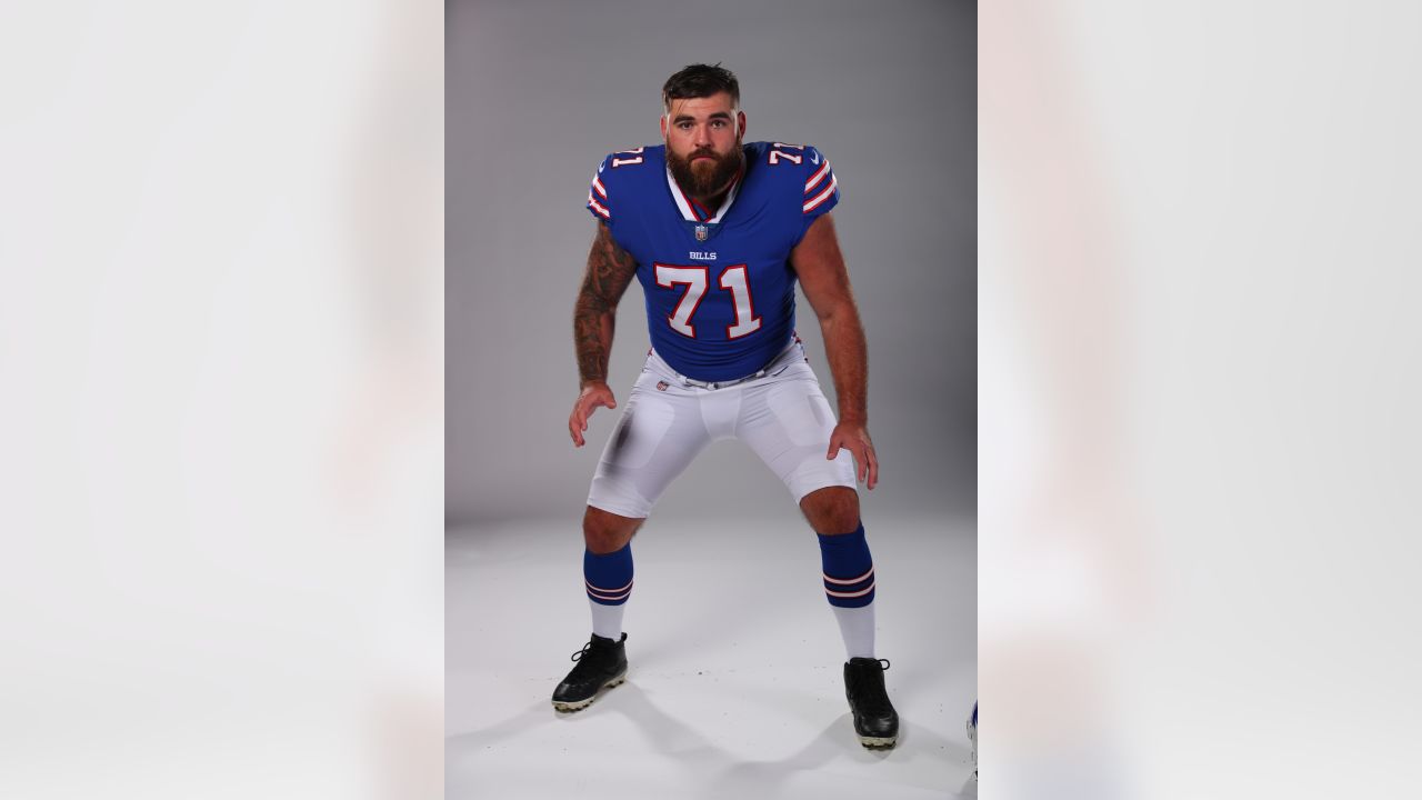 Buffalo Bills long snapper Reid Ferguson (69) walks the sidelines during an  NFL preseason football game against the Carolina Panthers on Friday, Aug.  26, 2022, in Charlotte, N.C. (AP Photo/Rusty Jones Stock