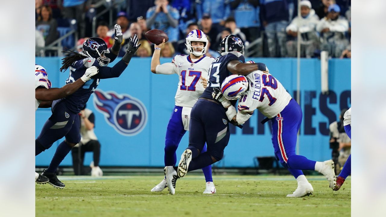 Titans stop Allen on 4th down, hang on to beat Bills 34-31