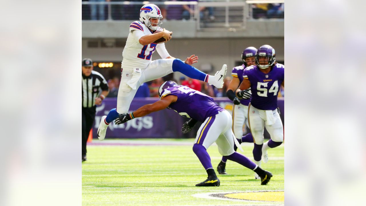 Buffalo Bills Quarterback Josh Allen Hurdles over Defenders During An AFC  match up 8x10 Action Photo Picture