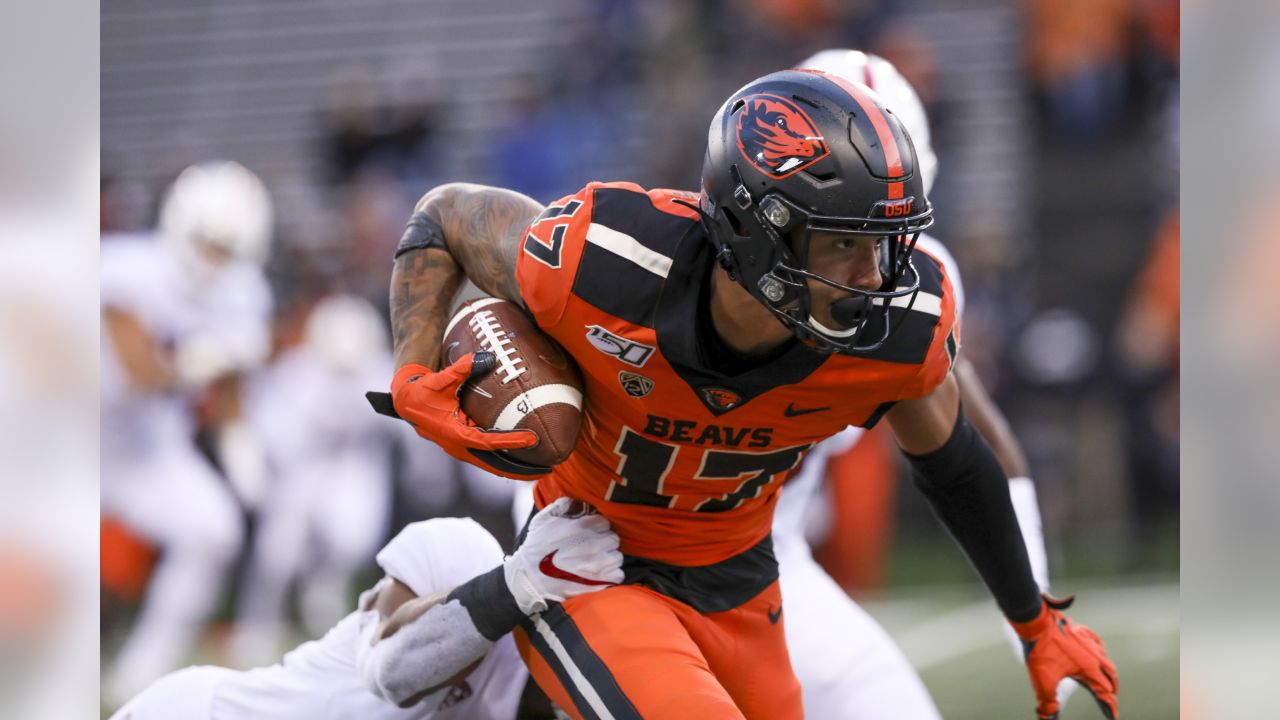 Oregon State receiver Isaiah Hodgins says he'd sign an autograph for an  Oregon Ducks fan maybe 