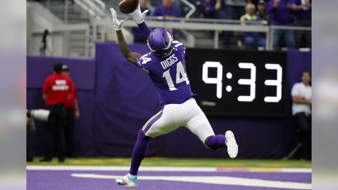 Minnesota Vikings wide receiver Stefon Diggs (14) carries in the second  half of an NFL wild-card playoff football game against the New Orleans  Saints, Sunday, Jan. 5, 2020, in New Orleans. (AP